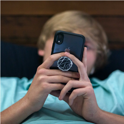 kid scrolling on a phone